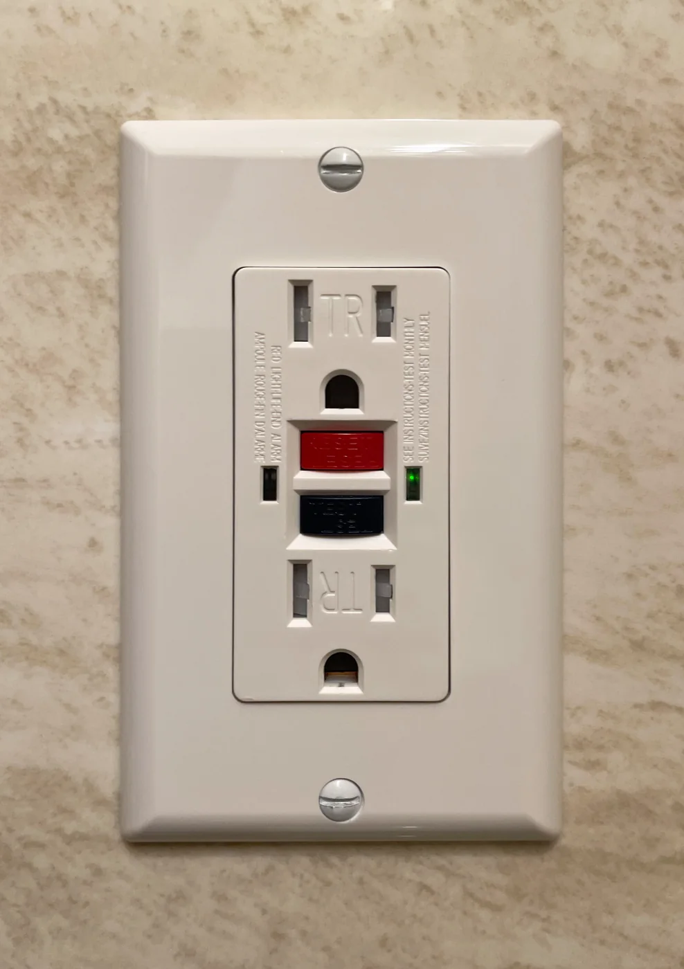 Residential GFCI receptacle with TEST and RESET buttons